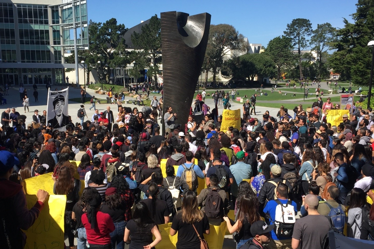 Students gathered on campus with the speaker